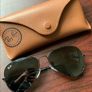 All black Ray Ban aviators